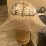 Blond, shoulder-length, in progress, front view.