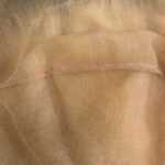 Blond, shoulder-length, in progress, close-up top view.