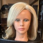 Blond, shoulder-length, front view.