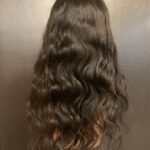 Human hair wig natural very dark brown wavy hair, rear view.