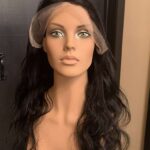 Human hair wig natural very dark brown wavy hair, front view.