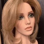 Light brown, shoulder-length, layers around face, right side view.